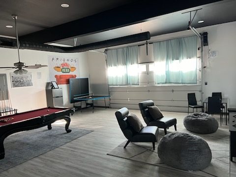 Game room with a pool table