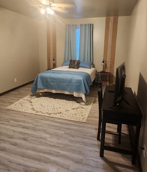 Bedroom with a queen bed